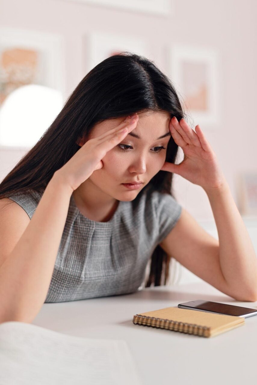 Therapy Isn't Working — What Should I Do? 1 Frustrated person sitting on a bed wondering why therapy feels stuck